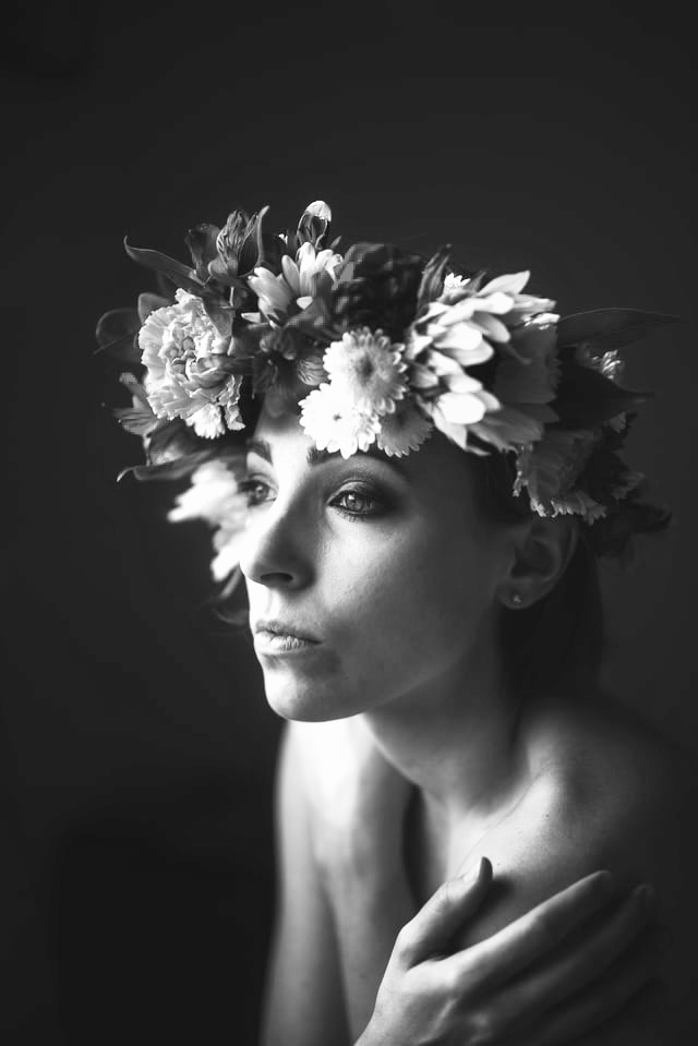 naked woman with flower crowns black and white